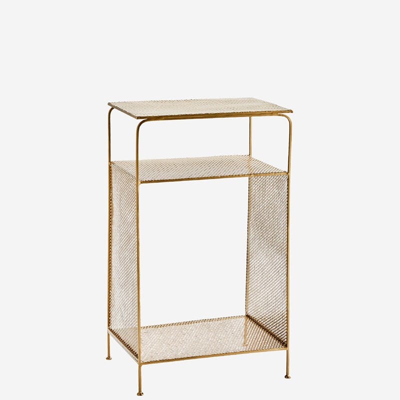 Kurver fylt med tekstiler sidebord